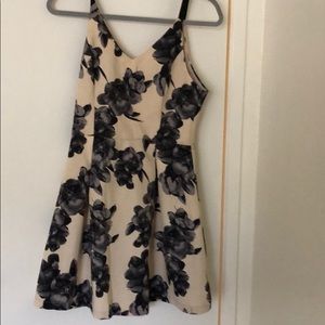 Cream dress with navy flowers. Size: M.
